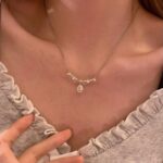 Nymph teardrop necklace sewn with an elegant piece of lace - Image 4