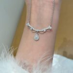 Nymph teardrop necklace sewn with an elegant piece of lace - Image 6