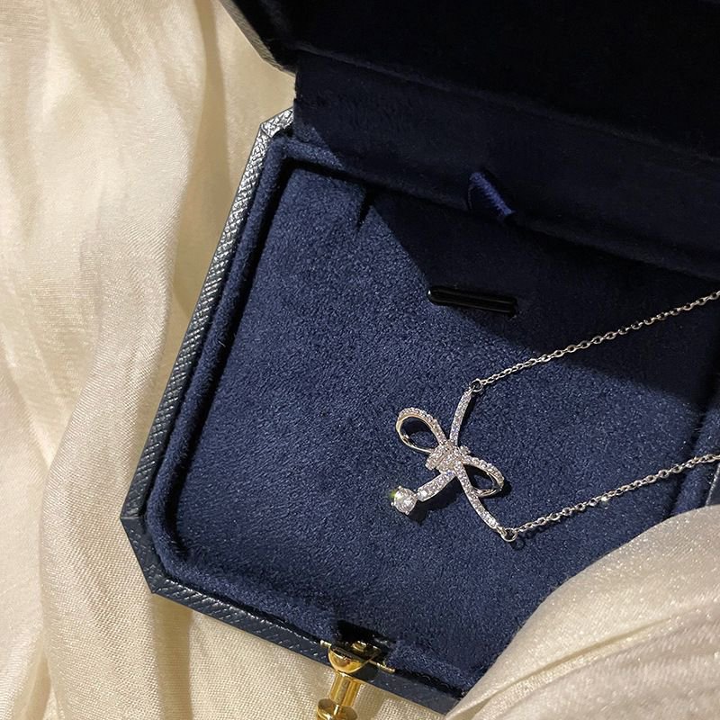 2026/03/1000580139.jpg A modern necklace in an elegant bow style - Image 1