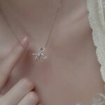 A modern necklace in an elegant bow style - Image 3