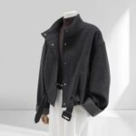 Women’s woollen jumper with a classic checked pattern and a stand-up collar, pieced together from different sections, from the Autumn/Winter 2025 collection; Korean-style, loose-fitting, casual, cropped, fashionable.
